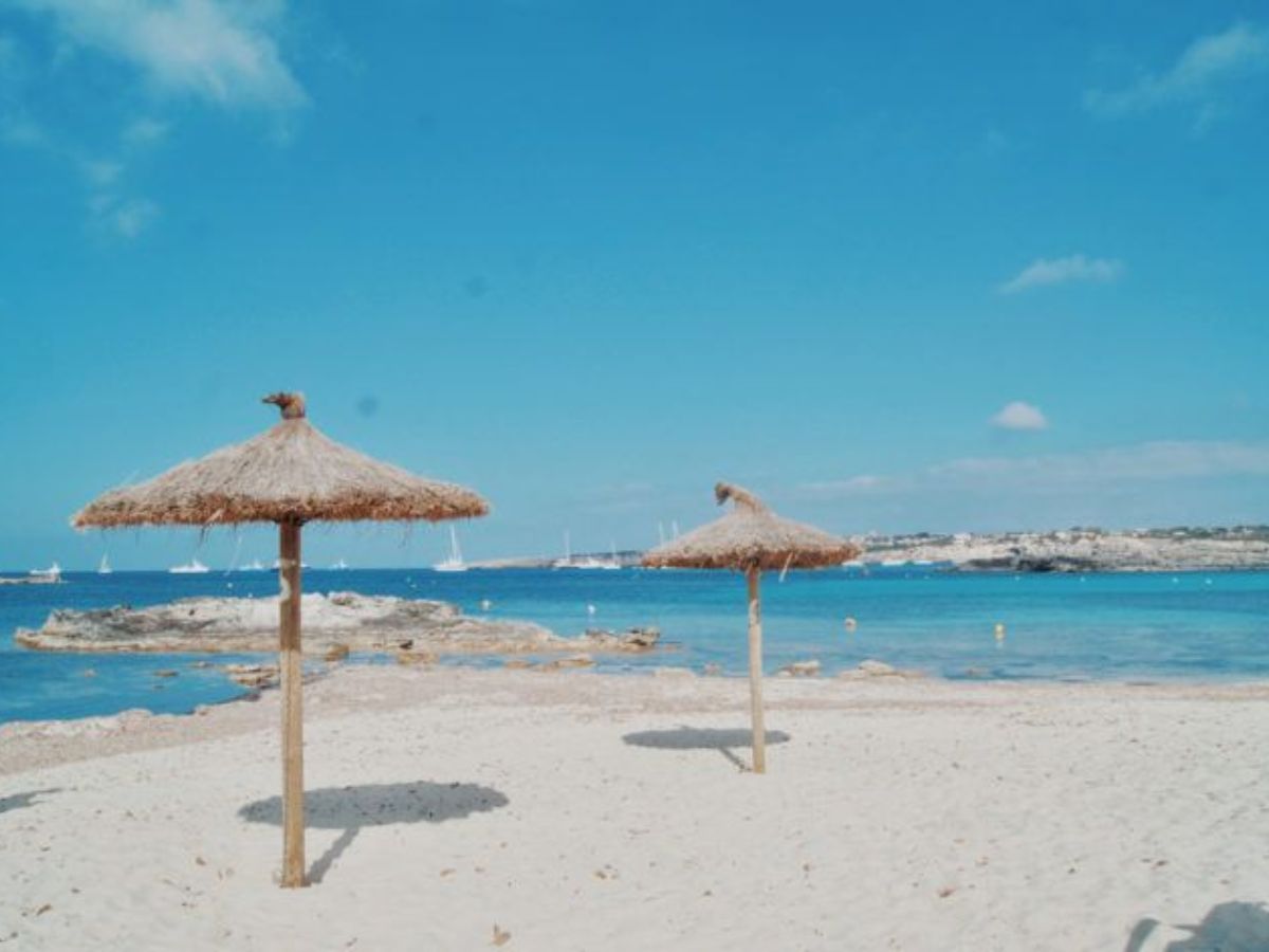 Formentera from Ibiza by boat — turquoise shallow waters and white sand beaches